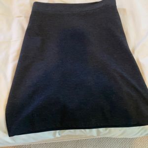 Grey skirt perfect with boots.